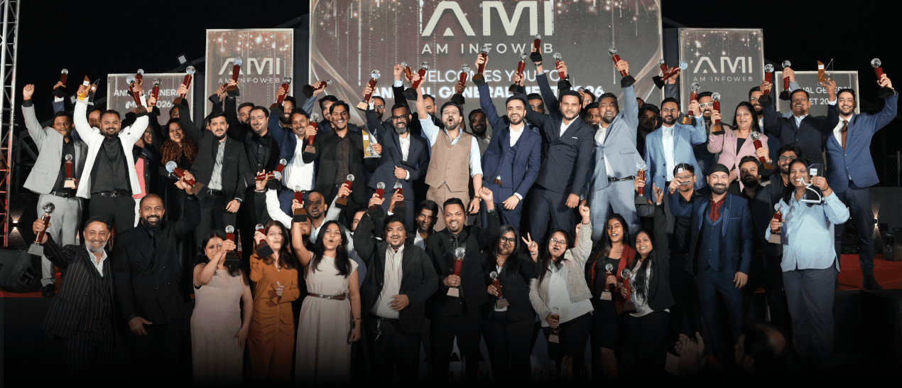 AM InfoWeb Annual General Meeting showing employees celebrating milestones and receiving awards at the annual company meet.