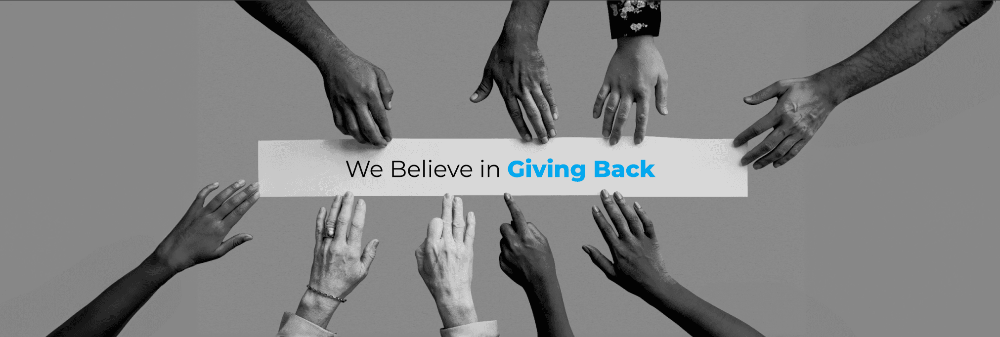AM InfoWeb giving back visual showing diverse hands reaching toward a message about community support and social responsibility.