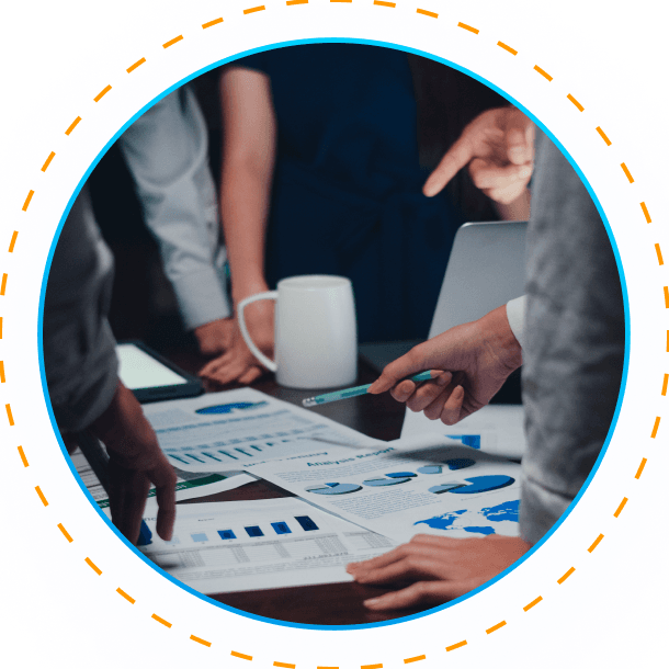 AM InfoWeb visual of professionals reviewing charts and reports, representing data-driven planning and operational insights.